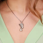 Silver Queen Nefertiti necklace worn by women with green dress