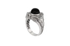 Silver ram ring with a black gemstone on a white background