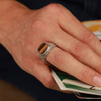 Hand holding a deck of cards with a close-up view