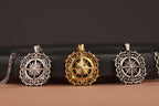 Three compass-themed North Star pendants on a black and brown gradient background