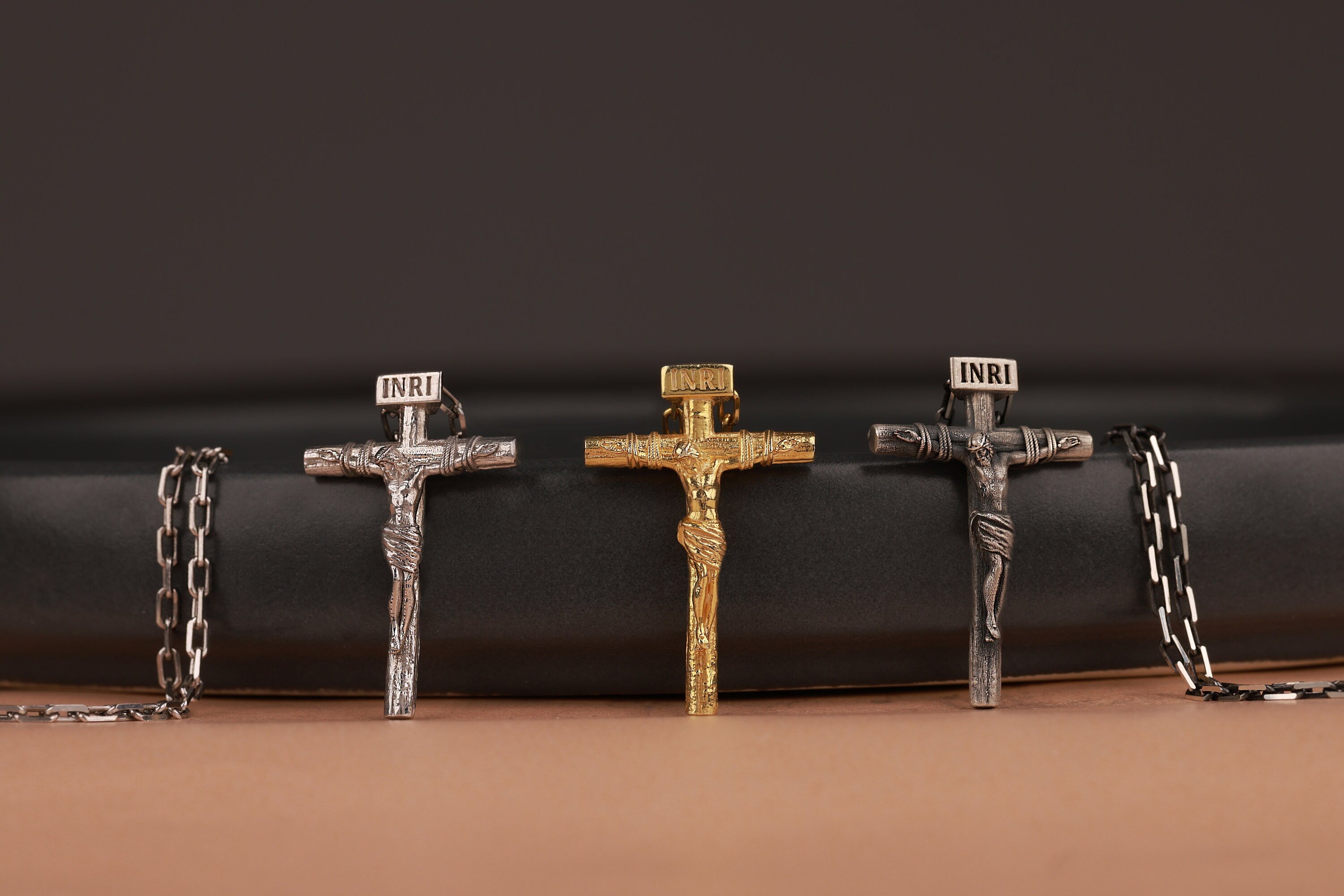 Jesus Crucifixion cross necklace in still-life - EternityPieces