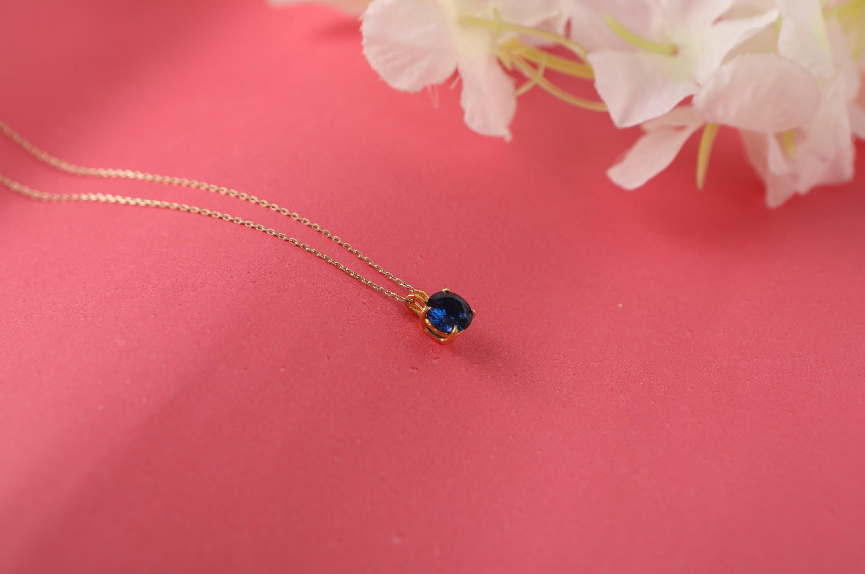 Blue sapphire necklace in still-life - EternityPieces
