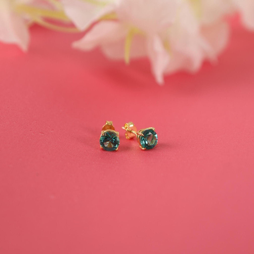 Paraiba tourmaline stud earrings set in still-life - EternityPieces
